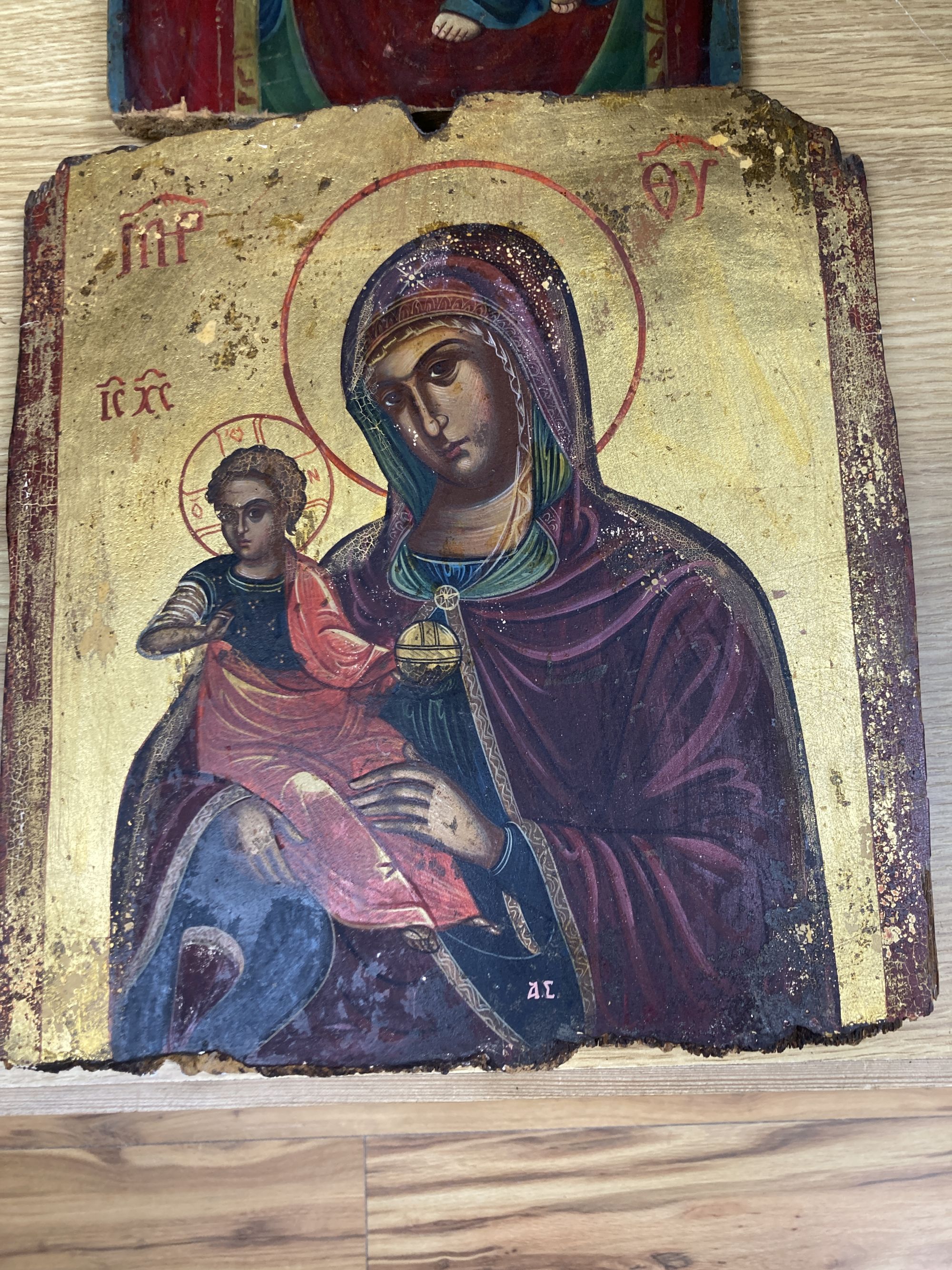 Two East European painted wood icons, largest 31 x 29cm